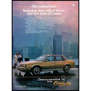 1985 Oldsmobile Cutlass Ciera Sedan Vintage Print Ad Waterfront Skyline Wall Art
